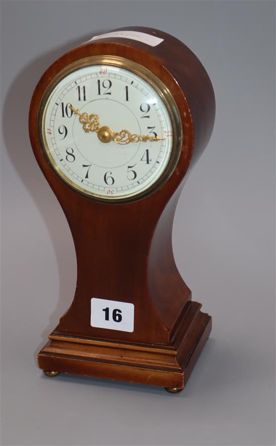 An Edwardian mahogany balloon timepiece height 24cm